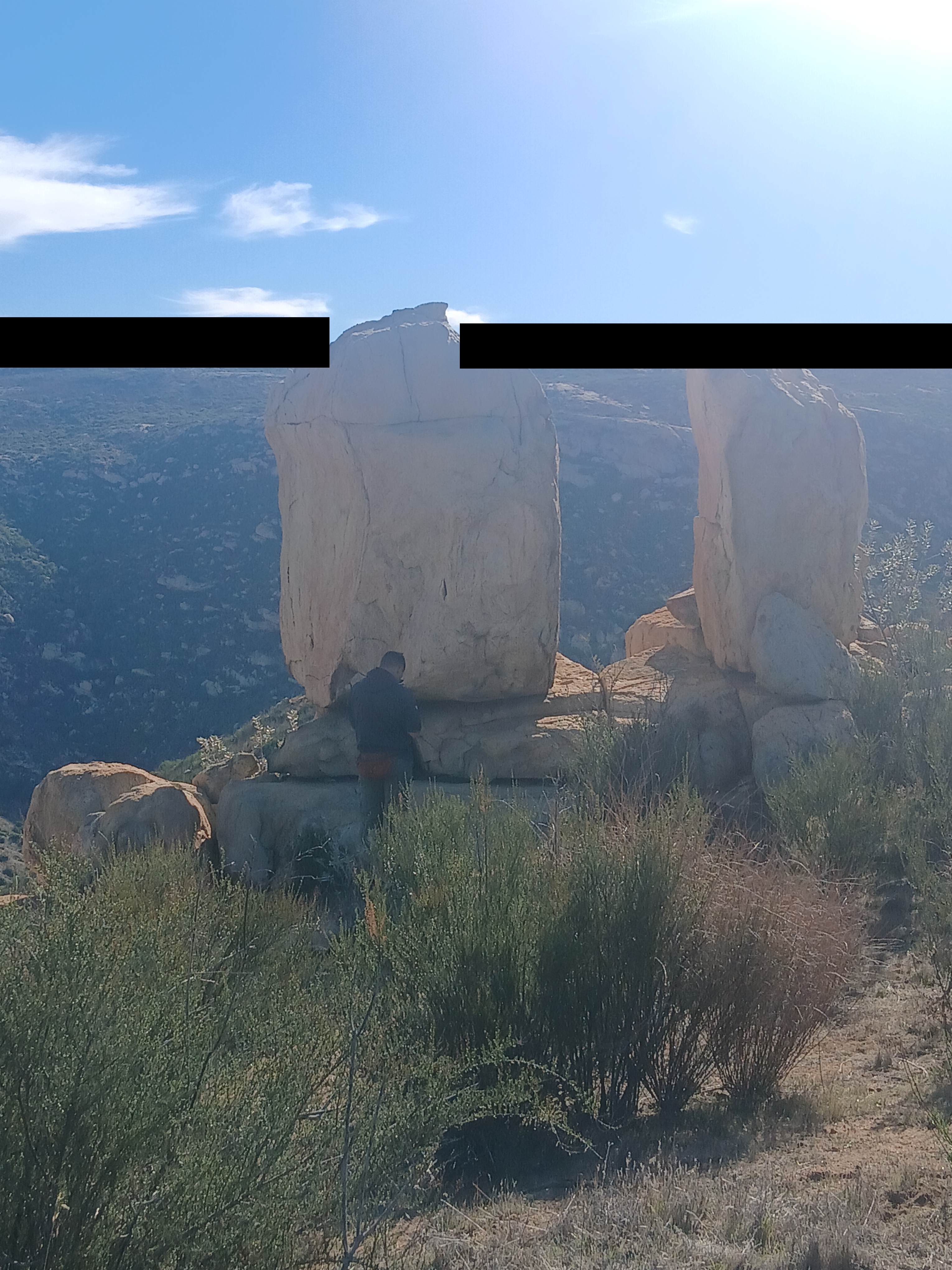 Monument with USFS archaeologist for scale